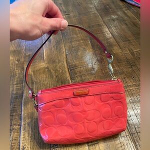 Coach patent leather wristlet.